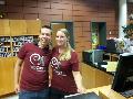 Photo of hostel staff wearing DebConf15 staff t-shirts (by Martin Krafft)